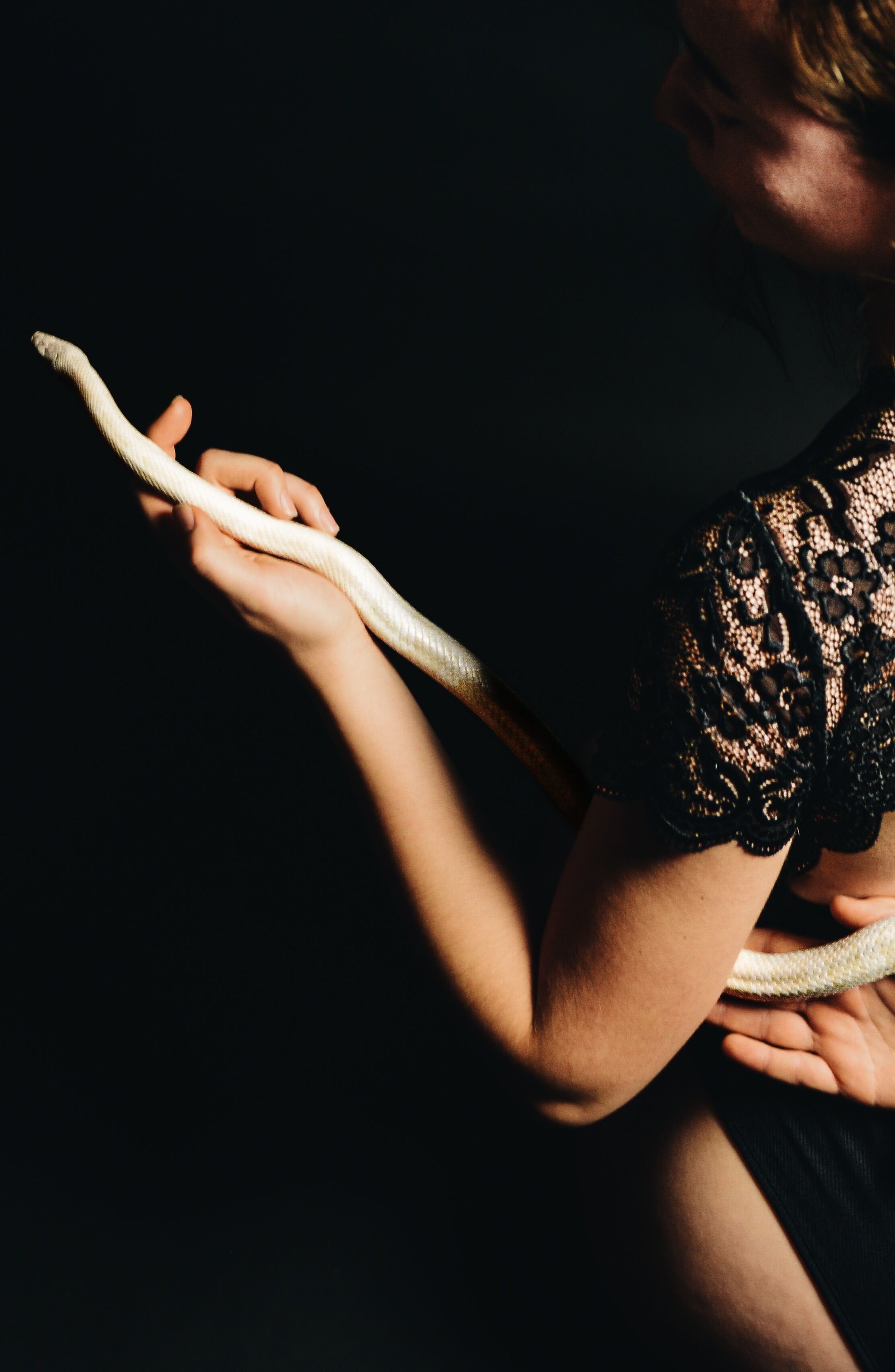 woman with a snake on her back